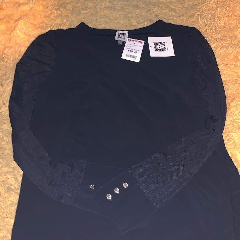 Brand new black long sleeve with mesh blouse. Size medium.